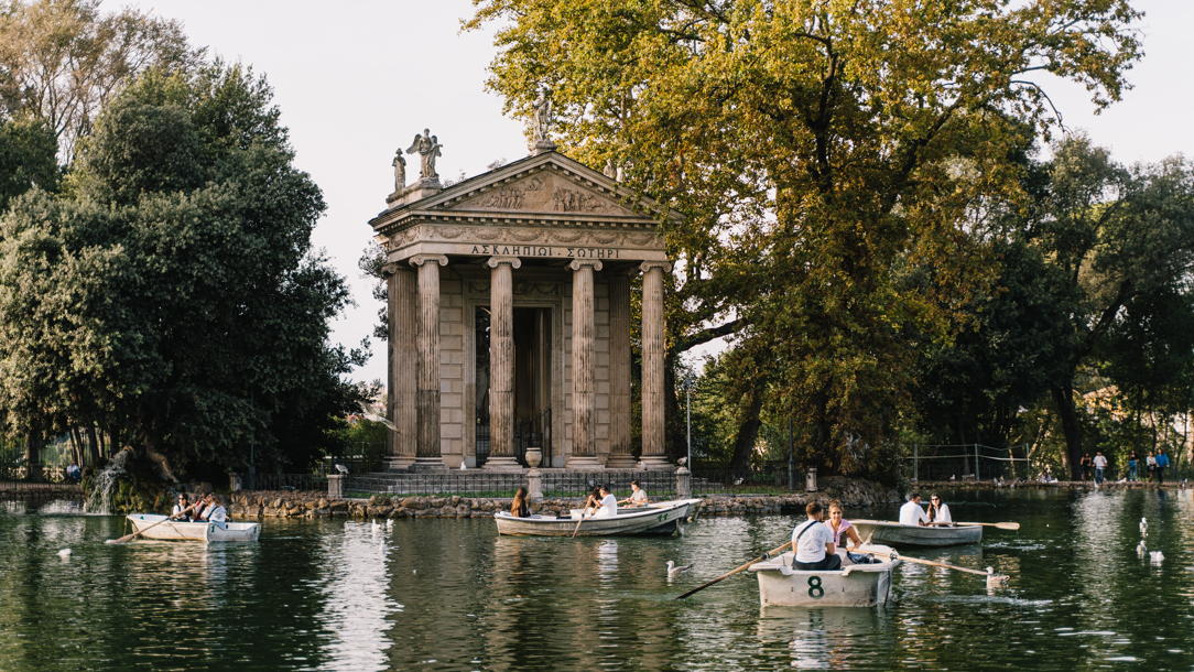 Boats on a lake near the Villa Borghese.