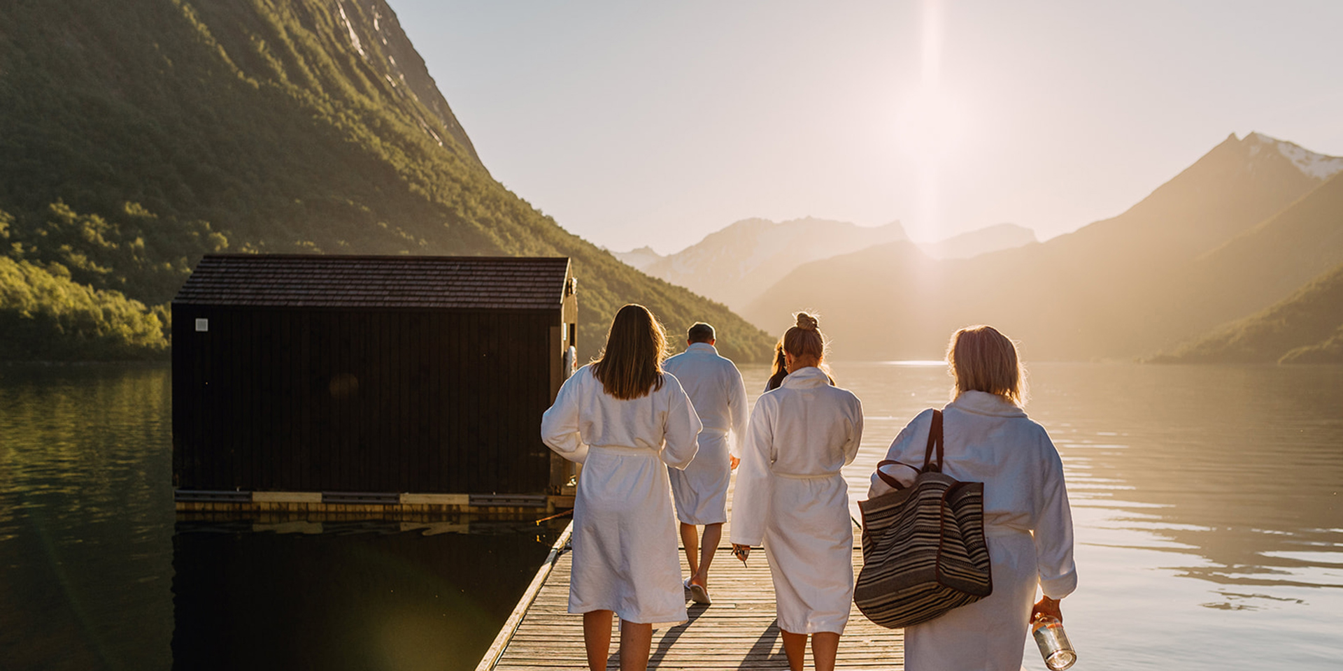 A group of friends about to swim in the open air at Hotel Union Øye Norway.