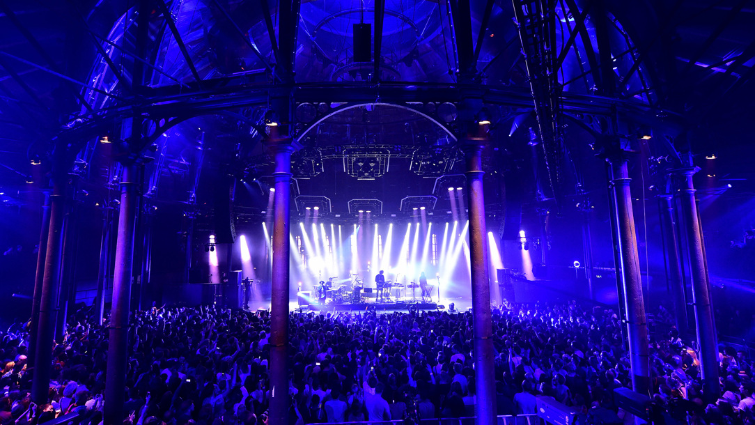 A performance with dramatic lighting at The Roundhouse in Camden.