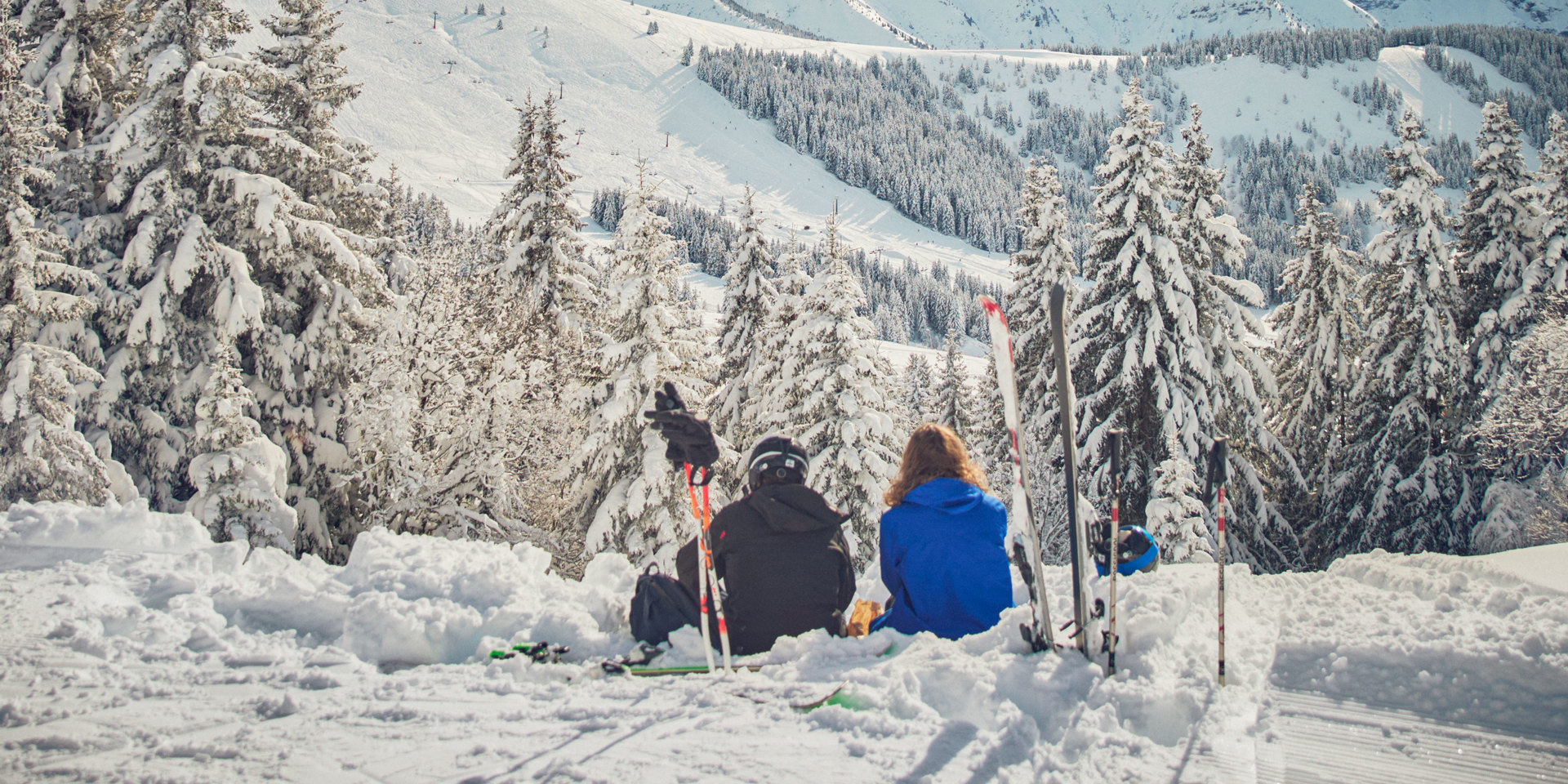 Two people about to go skiing.
