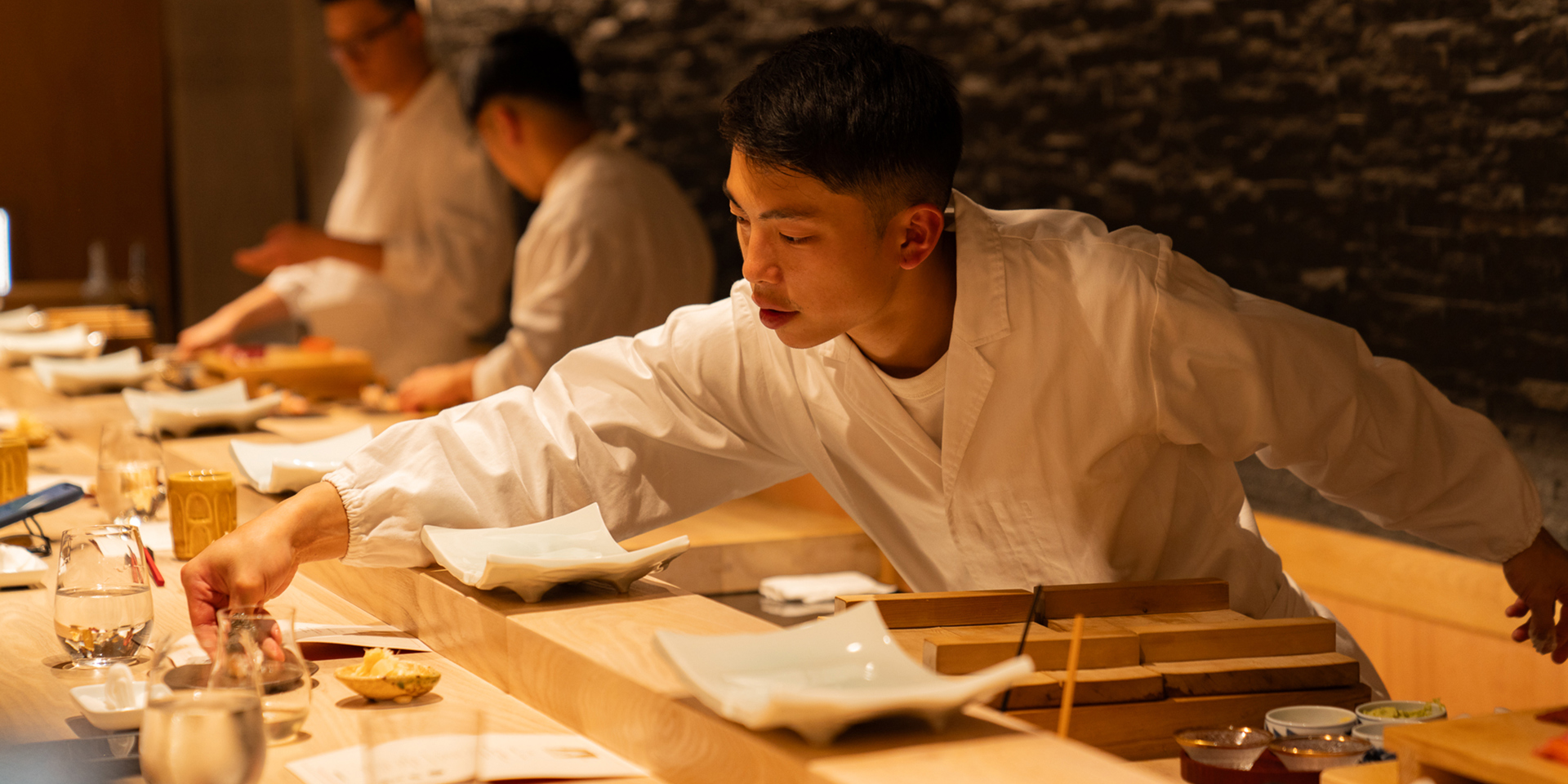 Chefs at work in Taku Mayfair