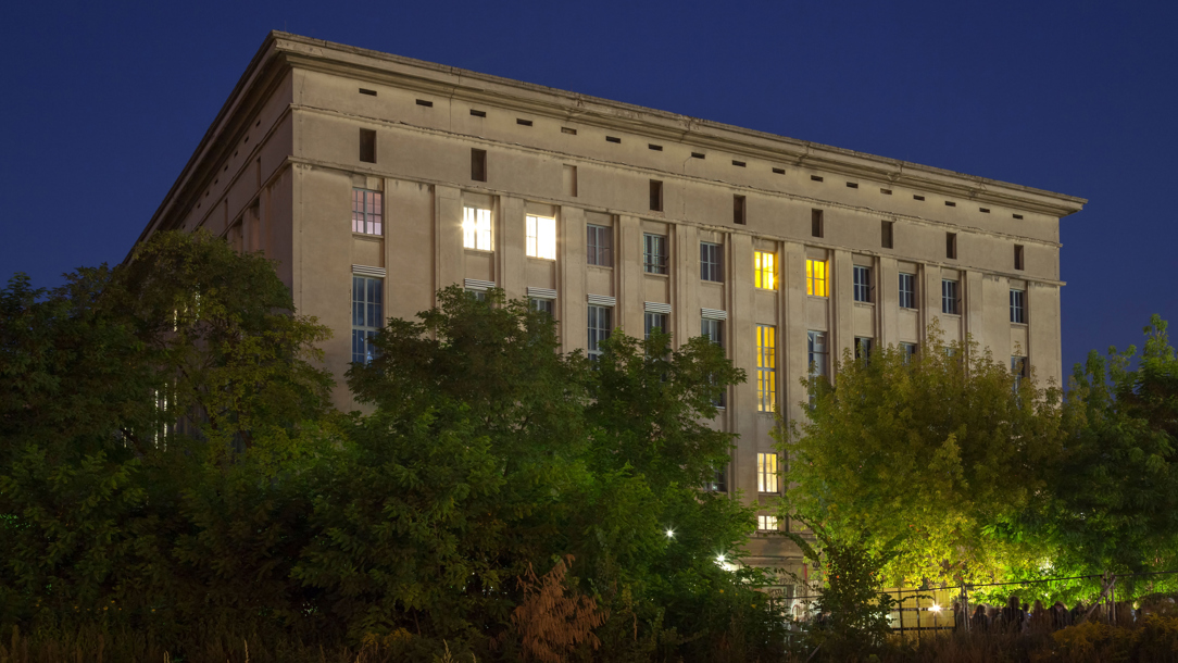 A grand building photographed at night.
