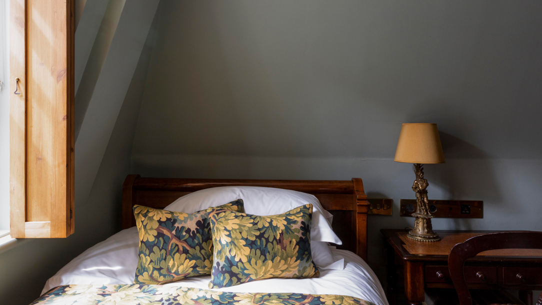A detail of a stylish bed at Batty Langleys hotel.