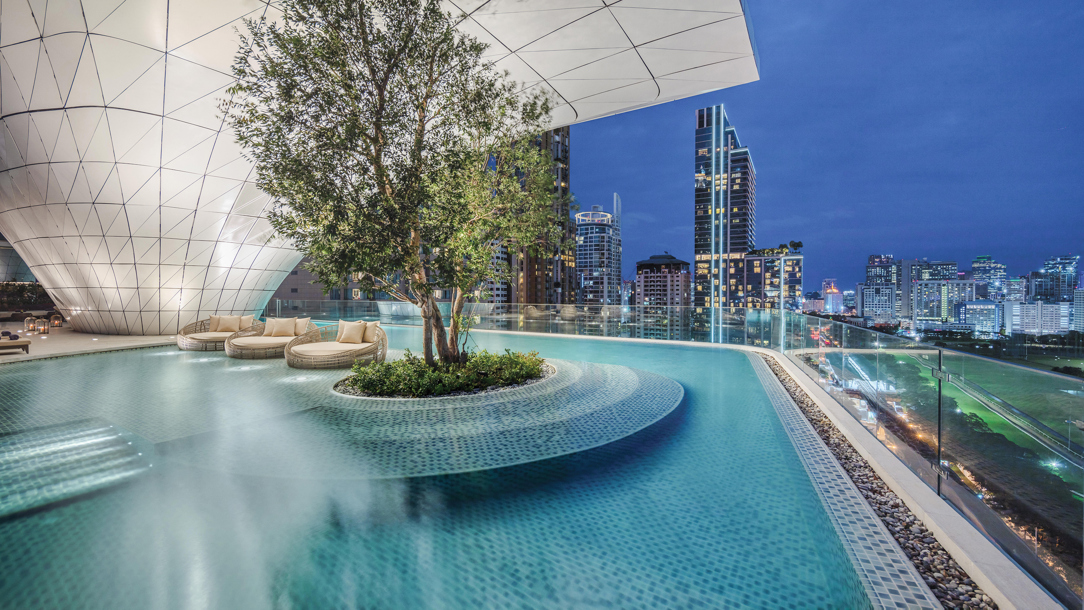 A tree in a water feature at the Waldorf Astoria Bangkok